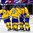 BUFFALO, NEW YORK - JANUARY 2: Sweden's Rasmus Dahlin #8, Marcus Davidsson #10, Axel Jonsson Fjallby #22 and Linus Lindstrom #16 join Fabian Zetterlund #28 in celebrating his second period goal against Slovakia during the quarterfinal round of the 2018 IIHF World Junior Championship. (Photo by Andrea Cardin/HHOF-IIHF Images)

